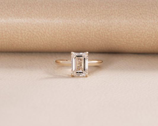 Emerald Lab Diamond ring with Cathedral setting hidden halo