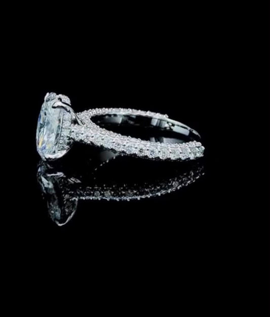Oval Lab diamond Engagement ring with hidden halo and 3 side diamonds on shank