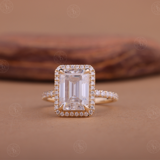 Emerald cut lab-grown diamond halo engagement ring in 14K gold with a sparkling halo setting