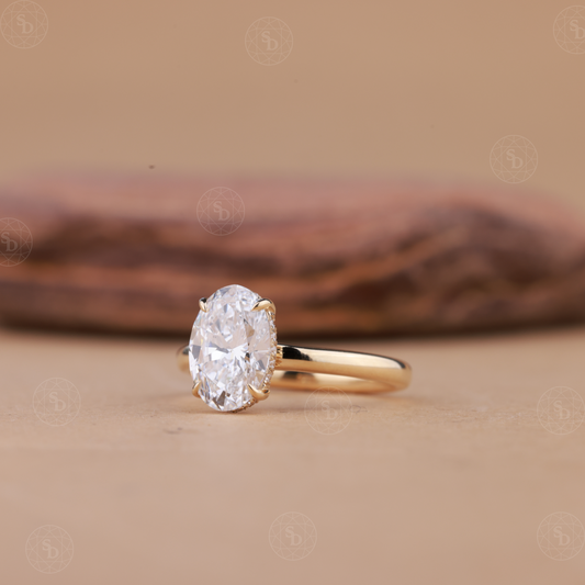 14K gold oval lab-grown diamond engagement ring with hidden halo setting