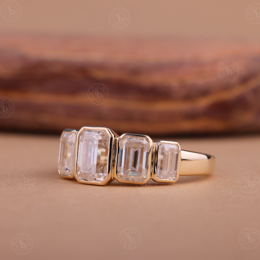 14K yellow gold wedding band with graduating emerald cut lab-grown diamonds