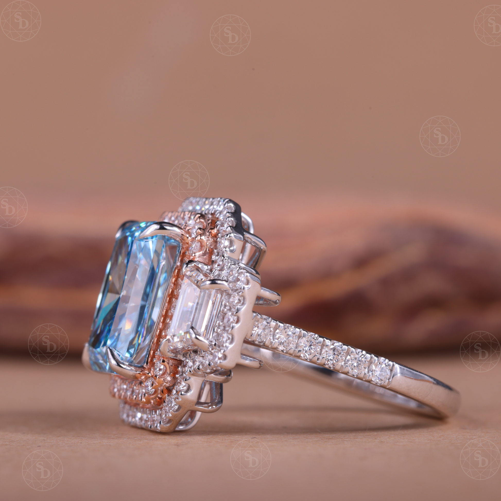 Two-tone gold engagement ring with fancy blue radiant cut lab diamond and double halo