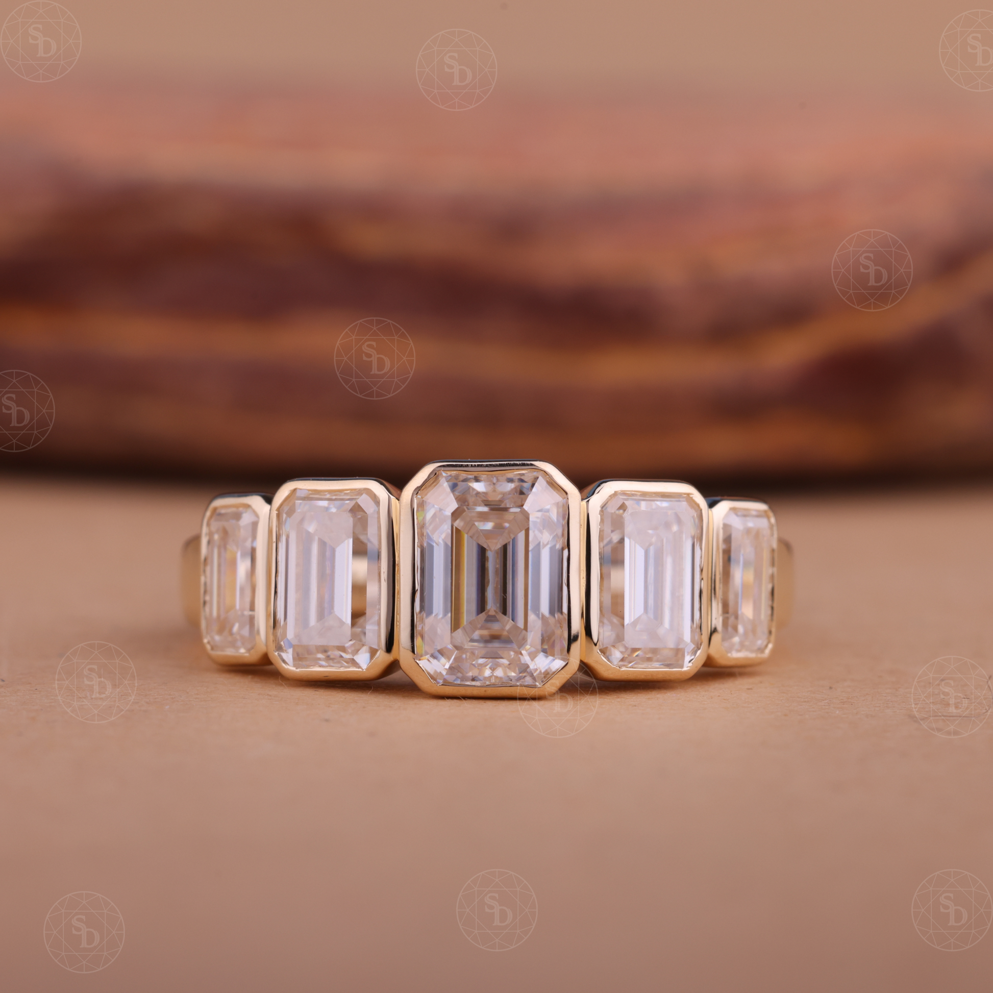 14K yellow gold wedding band with graduating emerald cut lab-grown diamonds