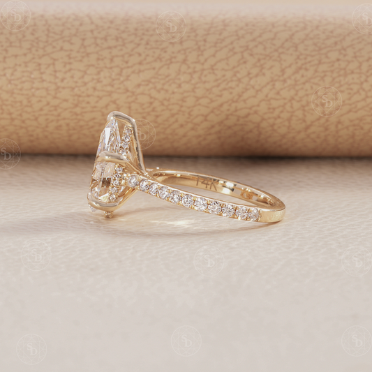 Pear Cut Lab Diamond Cathedral set ring with pave diamond and hidden halo