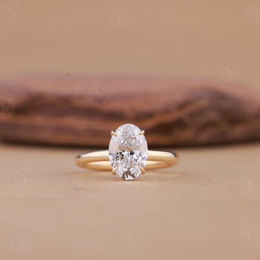 14K gold oval lab-grown diamond engagement ring with hidden halo setting