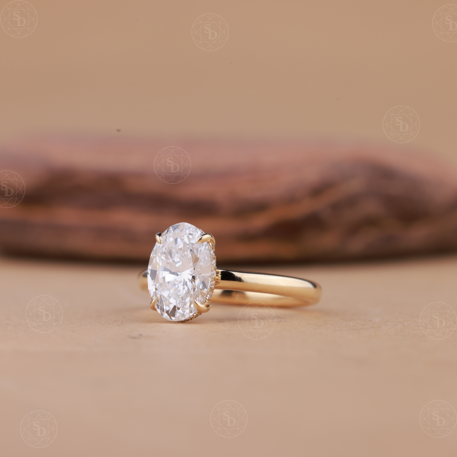 14K gold oval lab-grown diamond engagement ring with hidden halo setting