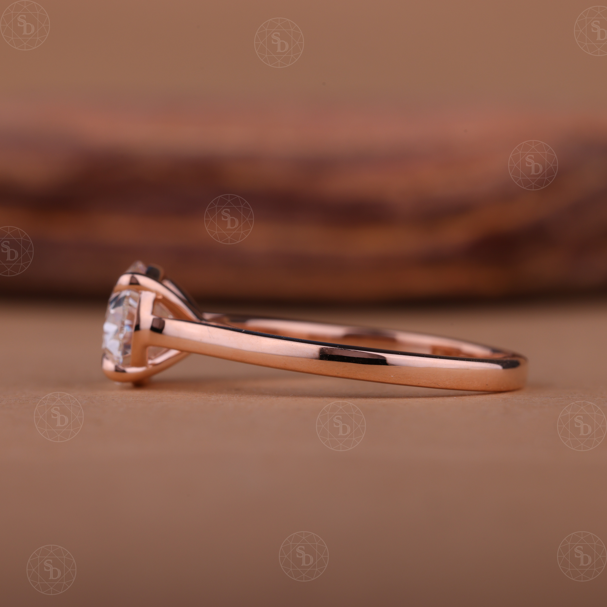 Oval lab-grown diamond engagement ring with east-west solitaire setting in gold