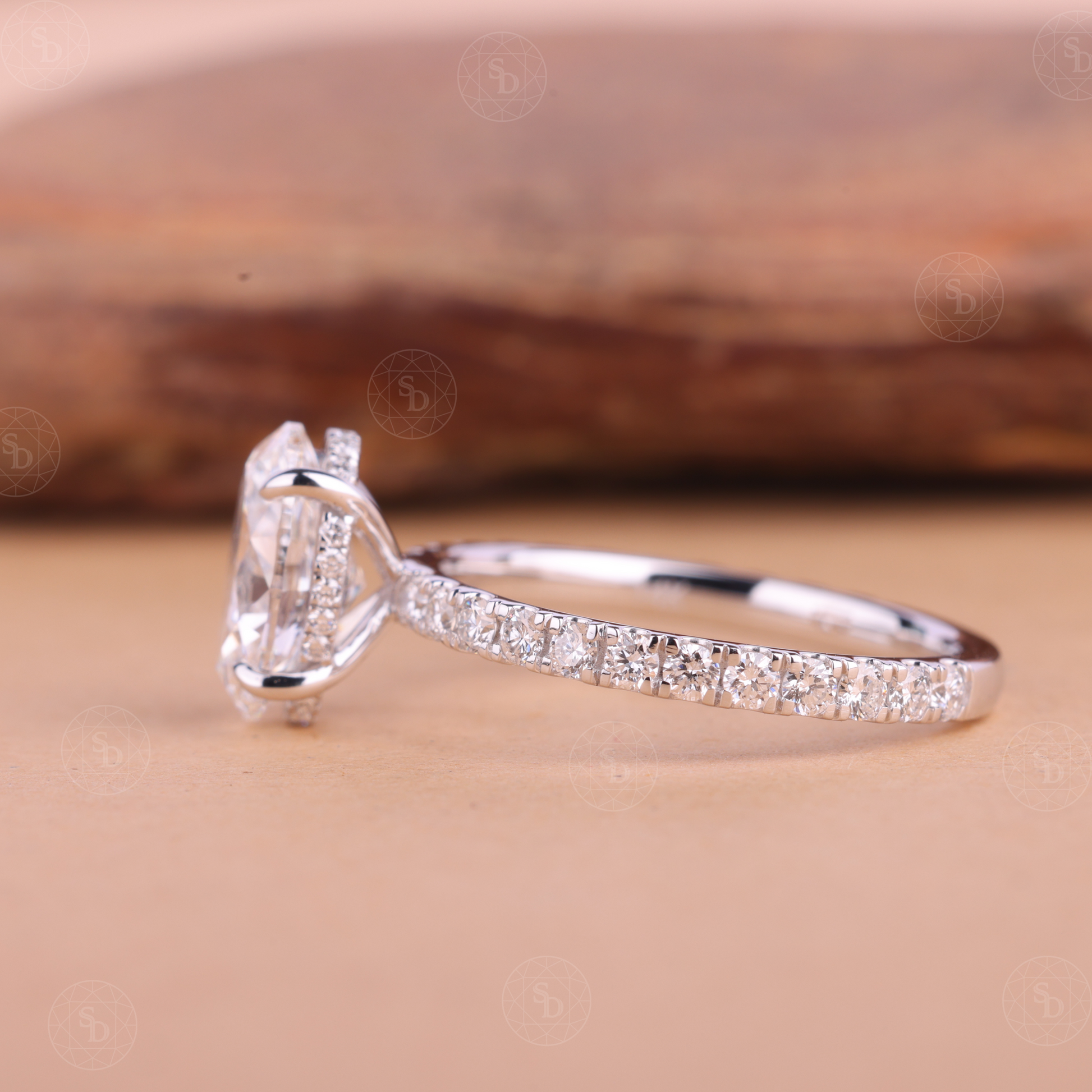 Oval lab-grown diamond engagement ring in solid gold with IGI certified VVS2 diamonds, elegant eternity band design, sustainable fine jewelry for women.