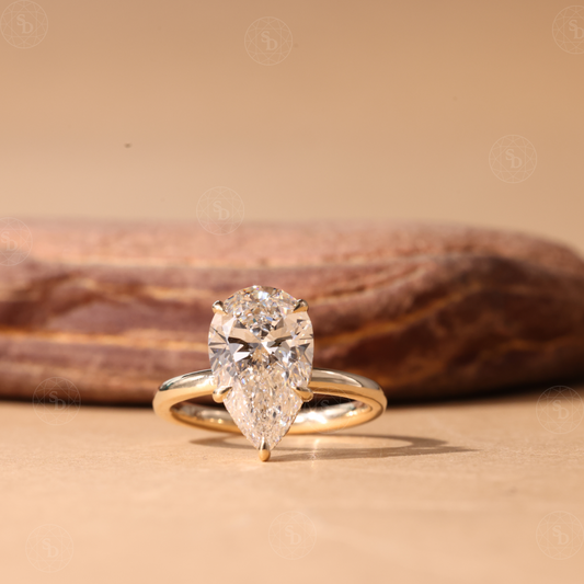 Pear cut lab-grown diamond solitaire engagement ring crafted in solid 14K gold