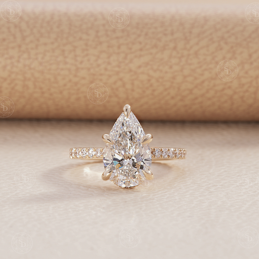 Pear Cut Lab Diamond Cathedral set ring with pave diamond and hidden halo