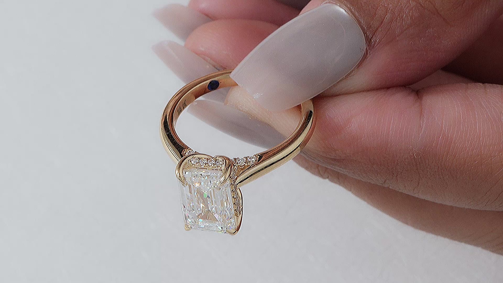 Emerald Lab Diamond ring with Cathedral setting hidden halo