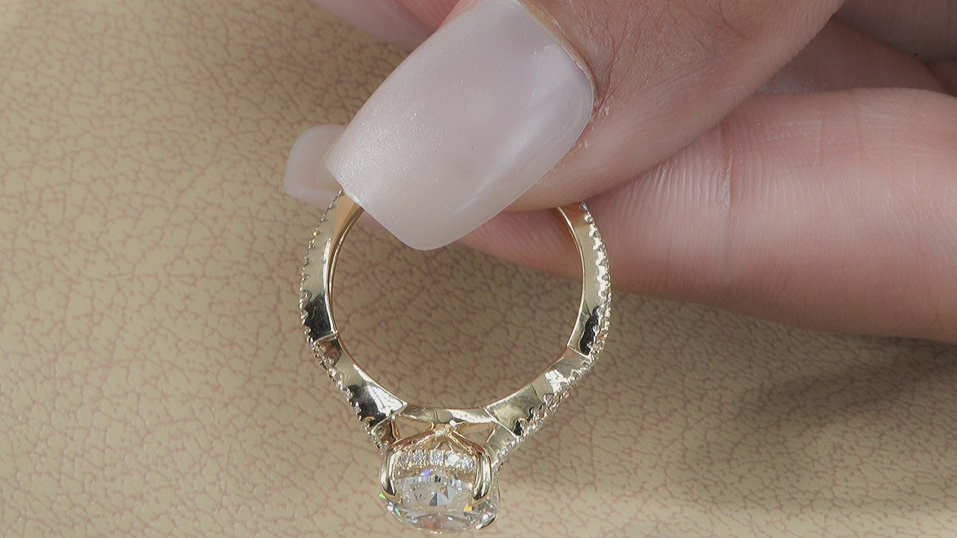 Oval Lab Diamond infinity band engagement ring with hidden halo and cathedral setting