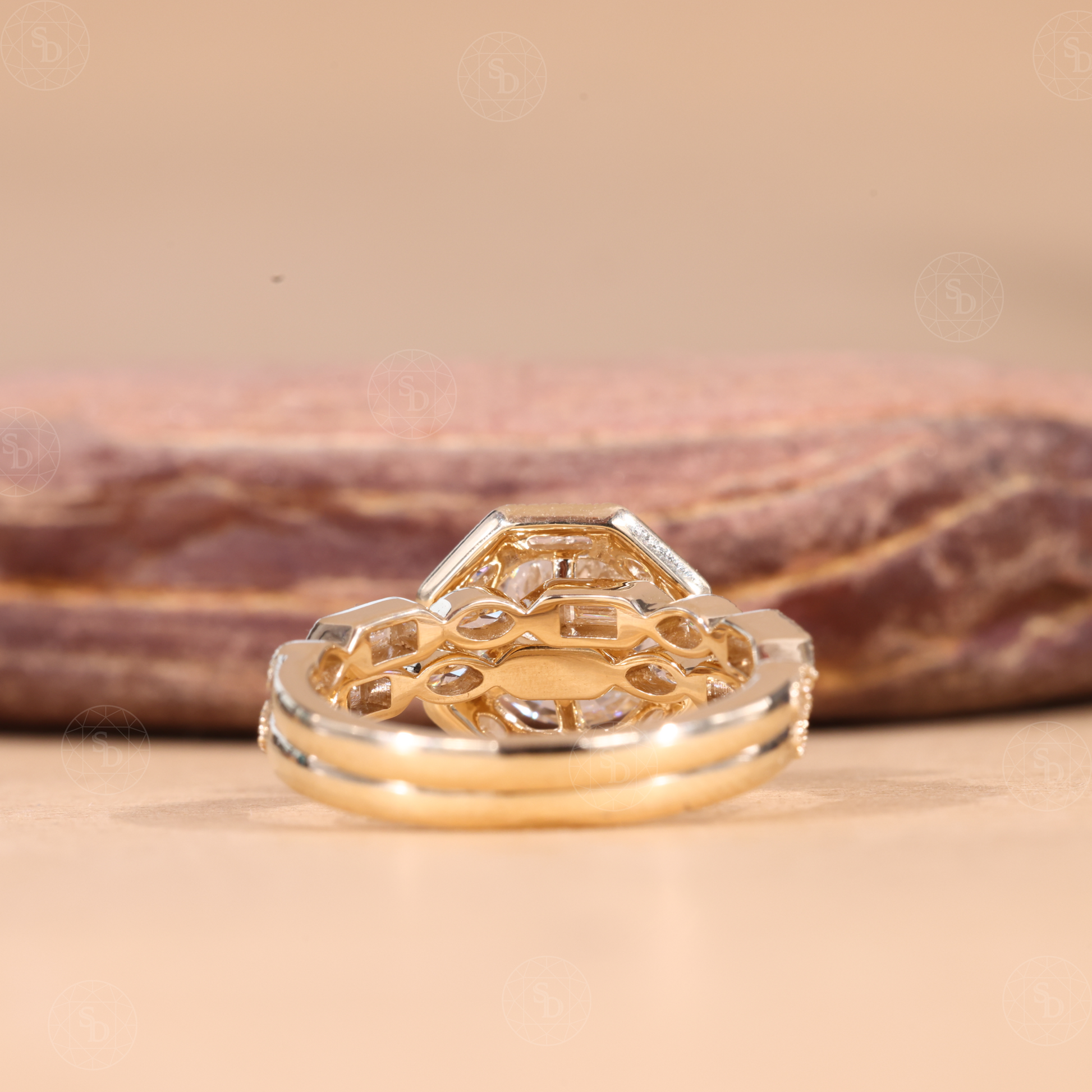 Vintage round cut lab-grown diamond engagement ring set with baguette and marquise halo, milgrain detailing, and elegant antique-inspired design in solid gold