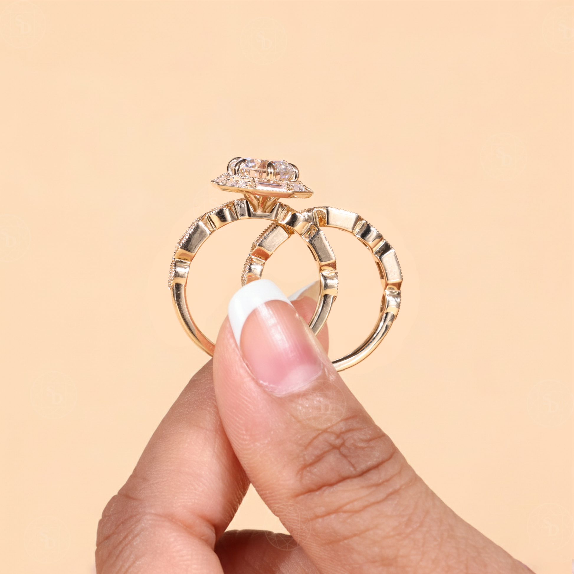 Vintage round cut lab-grown diamond engagement ring set with baguette and marquise halo, milgrain detailing, and elegant antique-inspired design in solid gold
